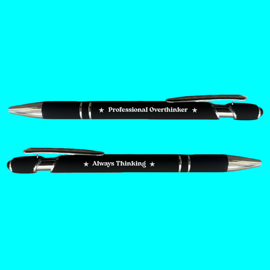 Two black pens with silver accents on a turquoise background